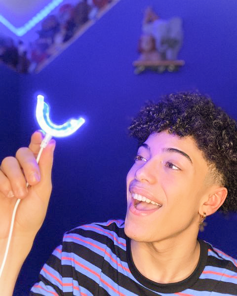 Man smiling with Teeth Whitening Kit for him