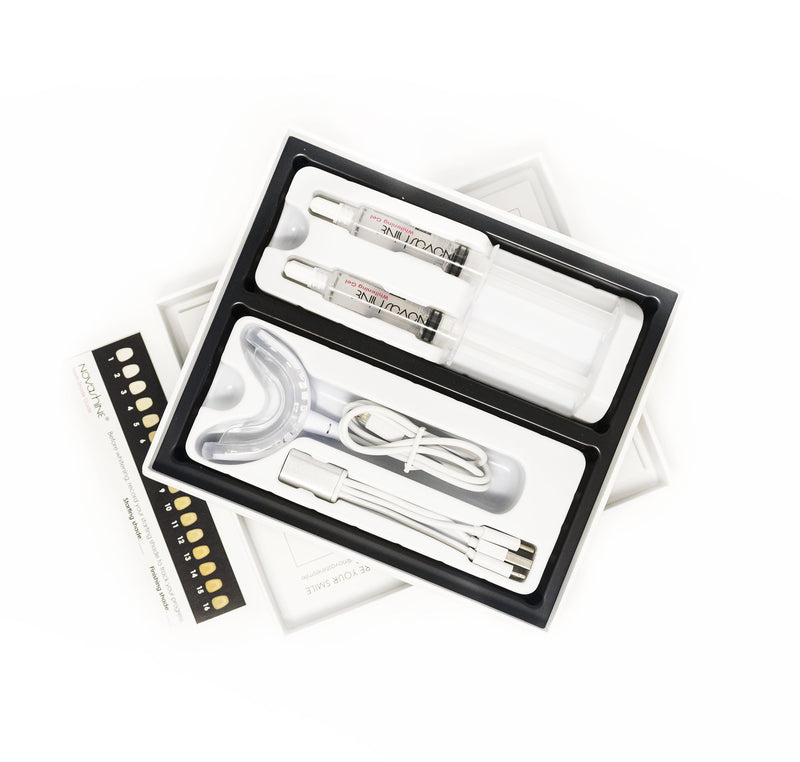 Teeth Whitening Kit Opened Novashine, 2 Gels and LED Light Mouthpiece